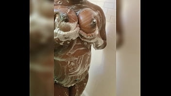 Bubble Butt Darkskin Busty Big Boob Haitian Playing With Long Nipples And Natural Tits Soaping Up Her Knockers Bouncing Big Tits
